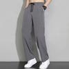Herren Sporthose aus Eisseide, schnelltrocknend, lockere Seitentaschen, Kordelzug, elastische Taille, einfarbig, für Fitnessstudio, Training, Jogging, lange Hose