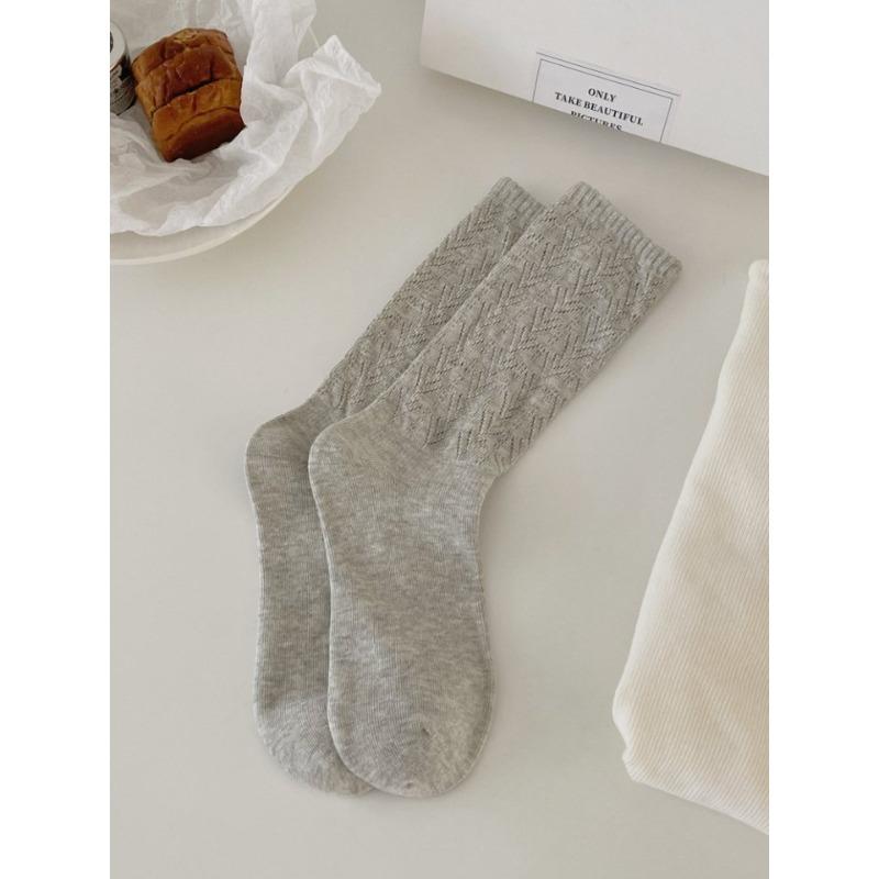 This Spring and Autumn Collection Features Solid-color Hollowed-out Mesh Pile Socks, Mid-calf Socks That Slimmer Legs, and Retro Style Socks