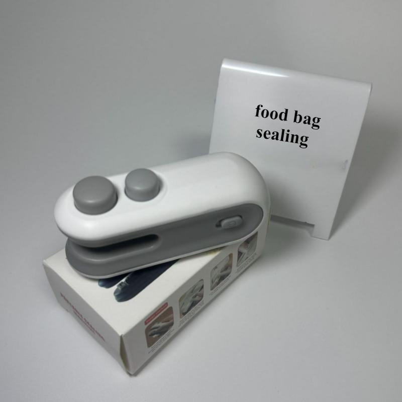 Mini Snack Sealing Machine Portable Household Cutting and Sealing Dual-purpose Plastic Bag Food Preservation Sealing