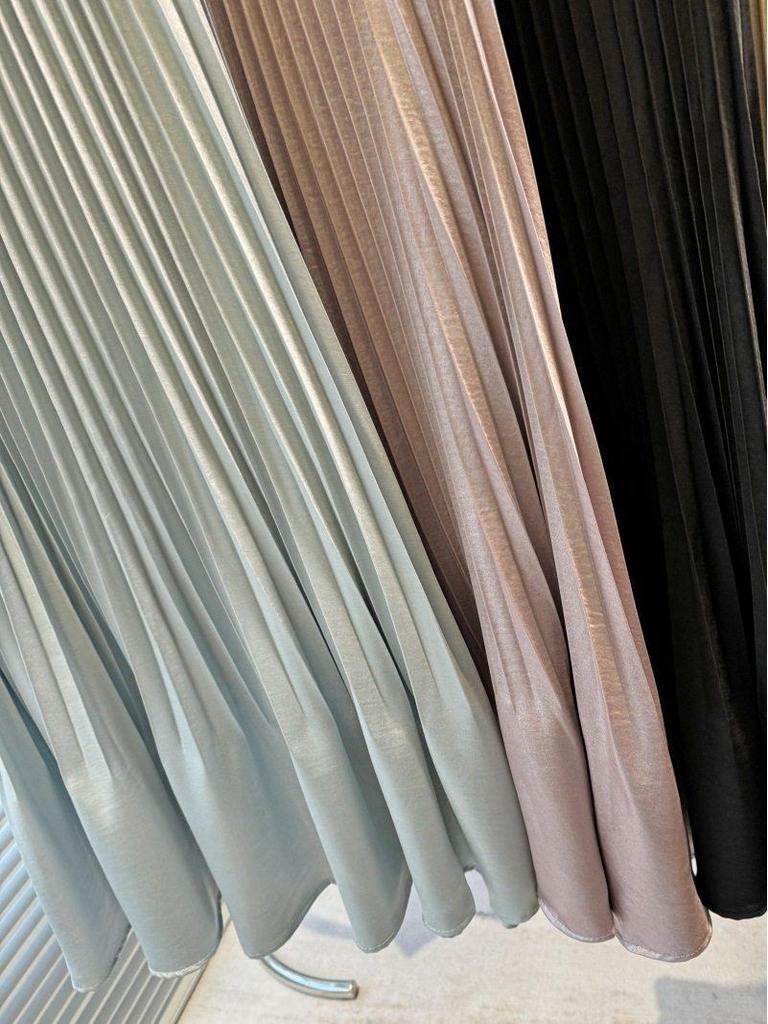 2026 Early Spring A-Line Pleated Skirt: Gentle, Versatile Design for Women's Mid-Length Fashion.