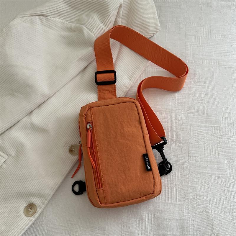 

Fashion sports outdoor men s and women s breast bags, mobile phone bags 2 new versatile travel shoulder messenger bags помаранчевий