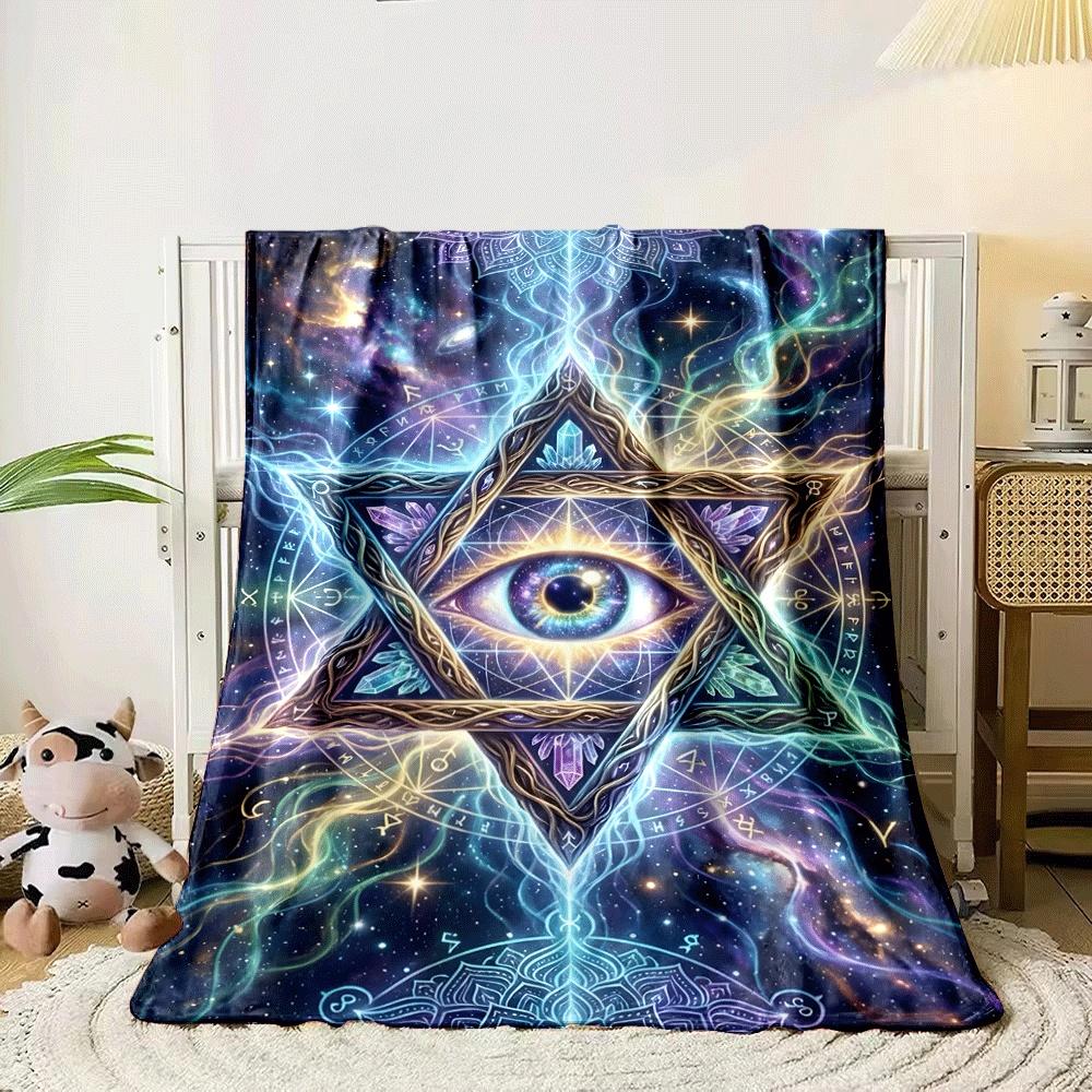 A glowing eye within an intricate star, surrounded by mystical patterns. for all seasons blanket lunch break throw gift