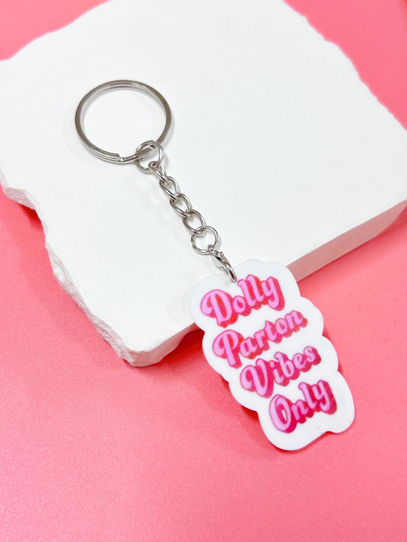 

Pink Dolly Parton Keychain: Black Letter Pendant Fan Charm розовый