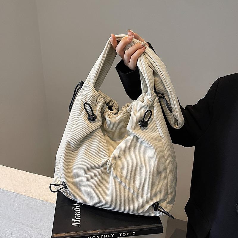 Autumn and Winter New Corduroy Tote Bag Women's Niche Drawstring Design Shoulder Bag Large Capacity Messenger Bag Commuting Versatile