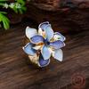 New enamel color hollow geometric daffodil elastic ring women's fashion high-end flower ring