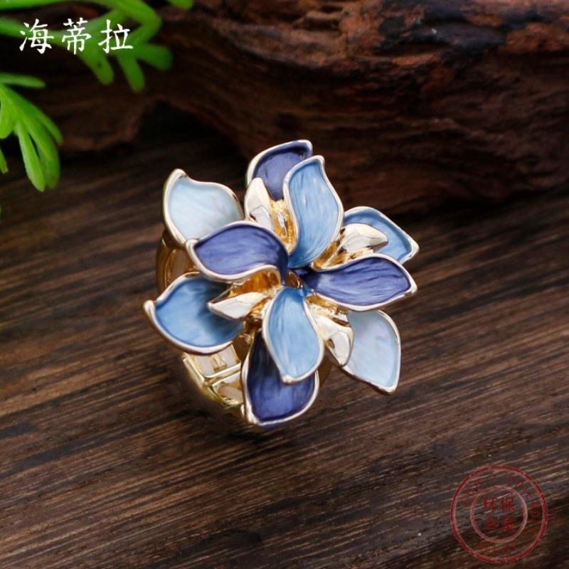 New enamel color hollow geometric daffodil elastic ring women's fashion high-end flower ring