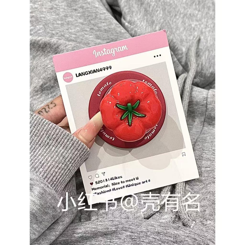 Small fresh blue background red polka dot tomato magnetic suction bracket is suitable for Apple 16 mobile phone case iPhone15/14/13.