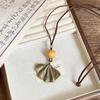 Bohemian wood beads beaded hollow round pendant necklace light luxury high-end sweater chain niche necklace accessories