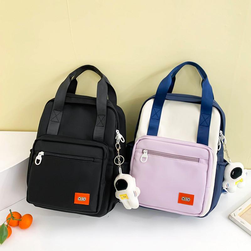 Unisex Primary School Student Backpack Waterproof Handbag With Colorful Patchwork Design
