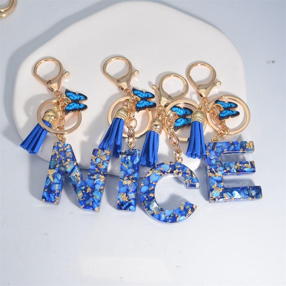 

Изысканный кулон-бабочка с кисточкой, брелок для ключей из смолы, автомобильный брелок, модный брелок для женщин и мужчин