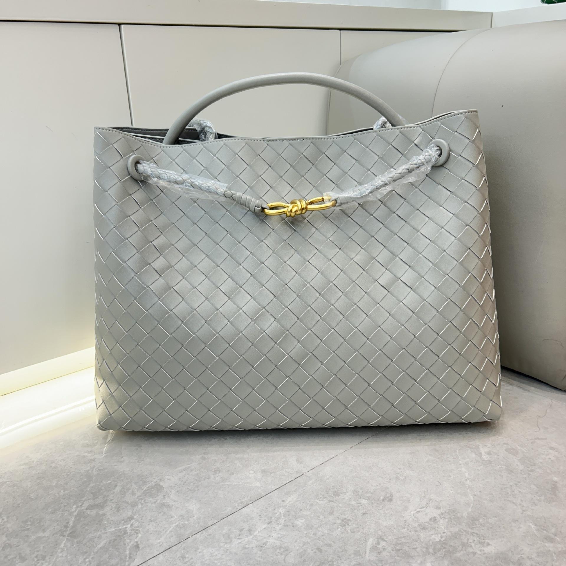 

Cross Border Новая кожаная большая плетеная бантовая металлическая веревочная пряжка ручная сумка через плечо подмышкой для женщин 42x18x35 CM серый