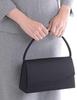 Made in Japan, this black formal bag features a water-repellent design and a large gusset. Perfect for weddings, funerals, and other formal