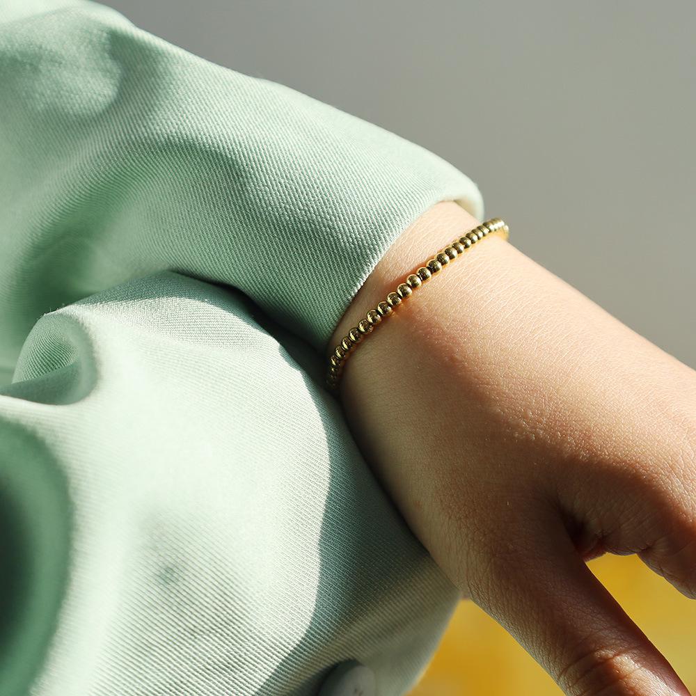 Fashion 18K Gold Elastic Rope Round Bead Titanium Steel Bracelet Niche High-End Hand Jewelry Does Not Fade