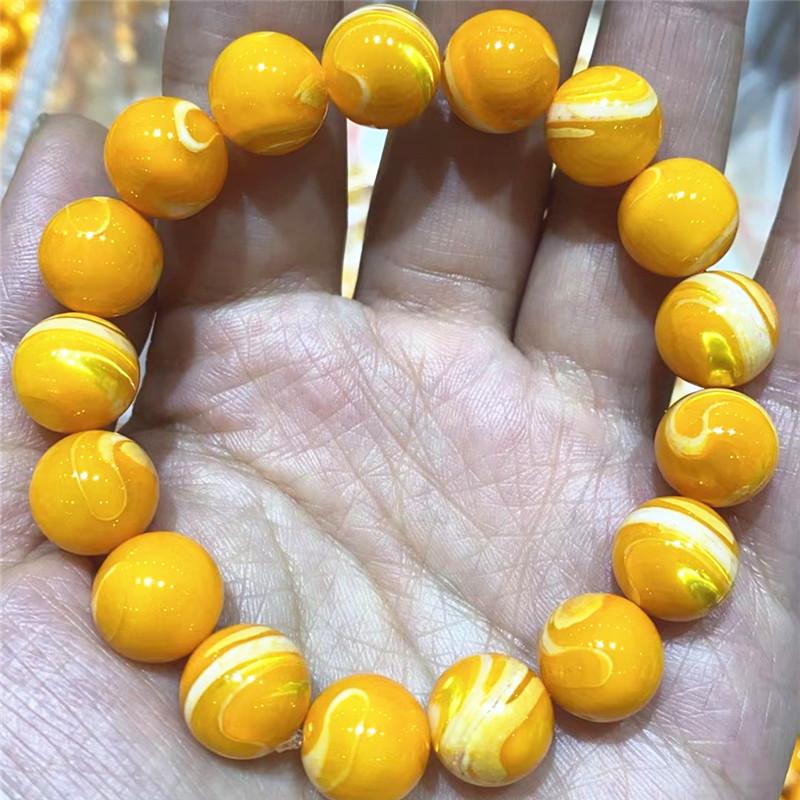 Natural gold and silver silk shell moonlight snail bracelet, Tai Chi pattern cat's eye effect, white disc shell batch, jade mother of pearl bracelet