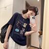 Mädchenhaftes kurzärmeliges T-Shirt mit Hundeprint und lockerer Passform für einen mühelosen Look