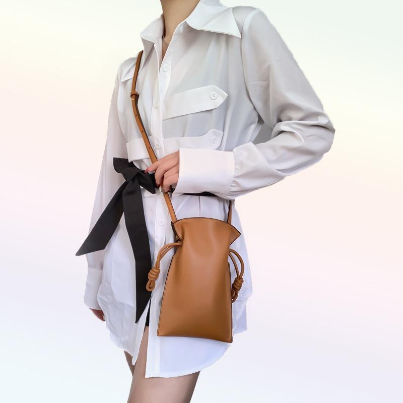 Versatile bag niche single shoulder small satchel generation drawstring mini lipstick mobile phone bag min bag