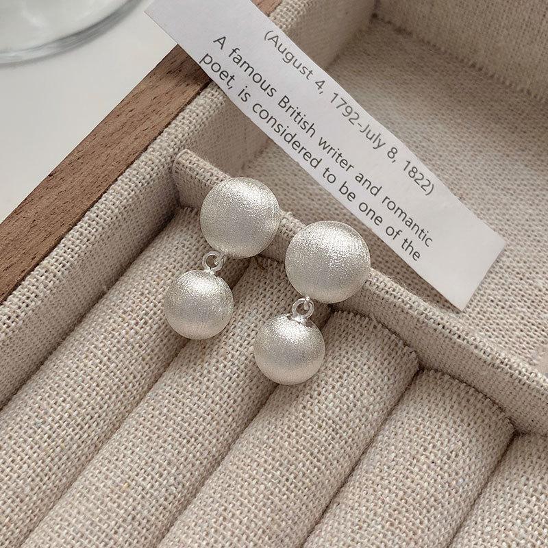 

Brushed Round Pendant Dynamic Earrings Cool Style Design
