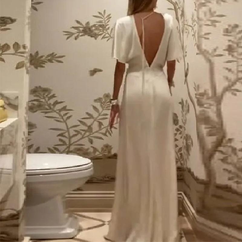 Women's spring new, European and American, temperament solid color pleated waist backless dress