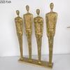 Kreativ Staty med Fyra Personfigurer Skrivbordsdekoration Hantverk Prydnader Abstrakt Karaktär Metallskulptur Estetisk Inredning för Rummet