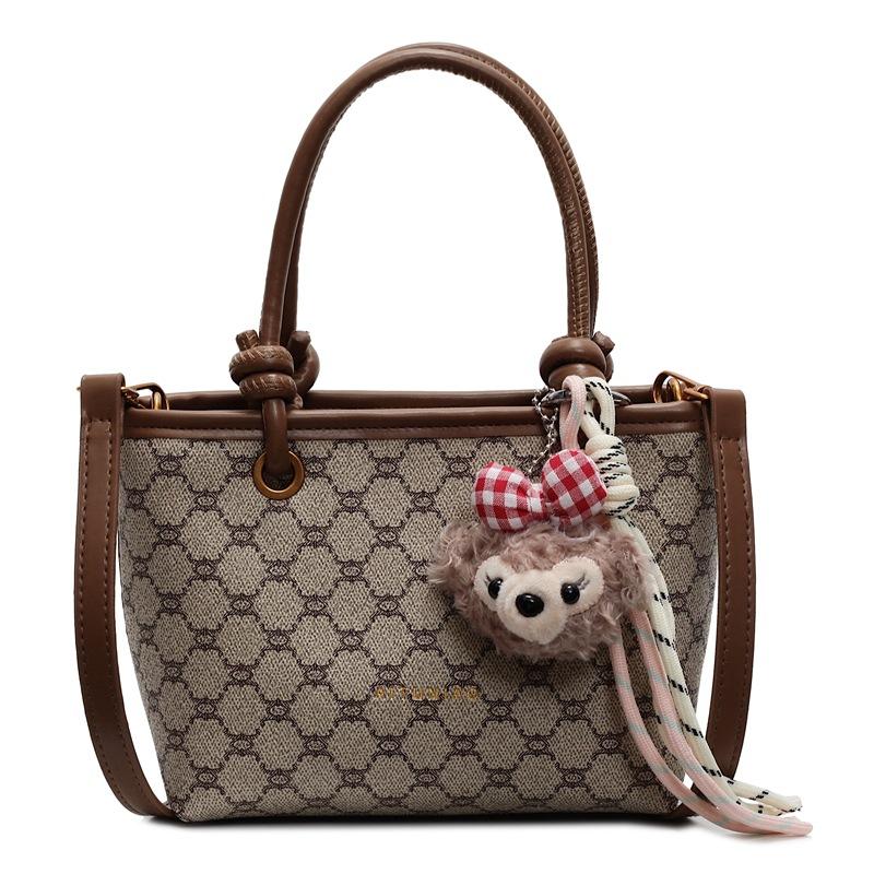 Retro portable small bag women's spring new popular versatile shoulder messenger bag commuter bucket bag