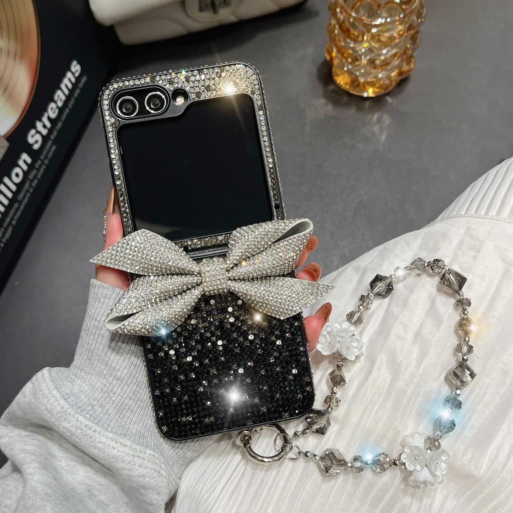 Applicable to Samsung ZFlip6 rhinestone bow flash diamond case zflip7 folding screen all-inclusive luxury bracelet protective case