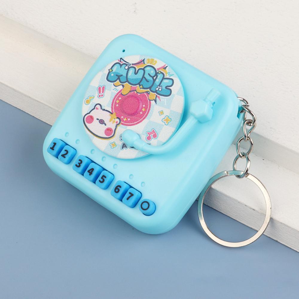 

Ручний музичний електронний клавішний міні-фонограф піаніно світний мішок брелок гашапон машина іграшка машина для захоплення подарунок брелок синій