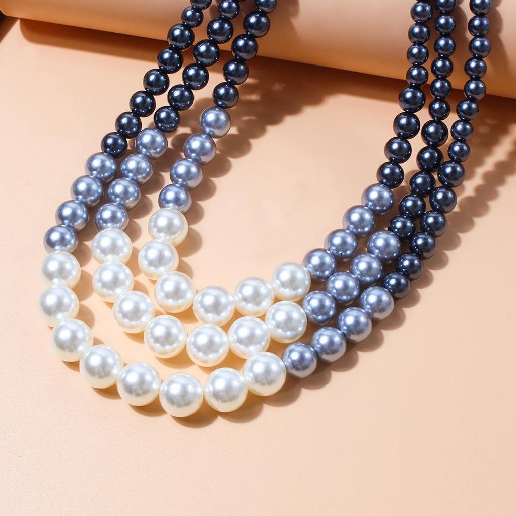 Europäische und amerikanische mehrlagige Modeschmuck-Halskette mit Imitationsperlen - Doppellagige Pulloverkette mit Kreuzanhänger