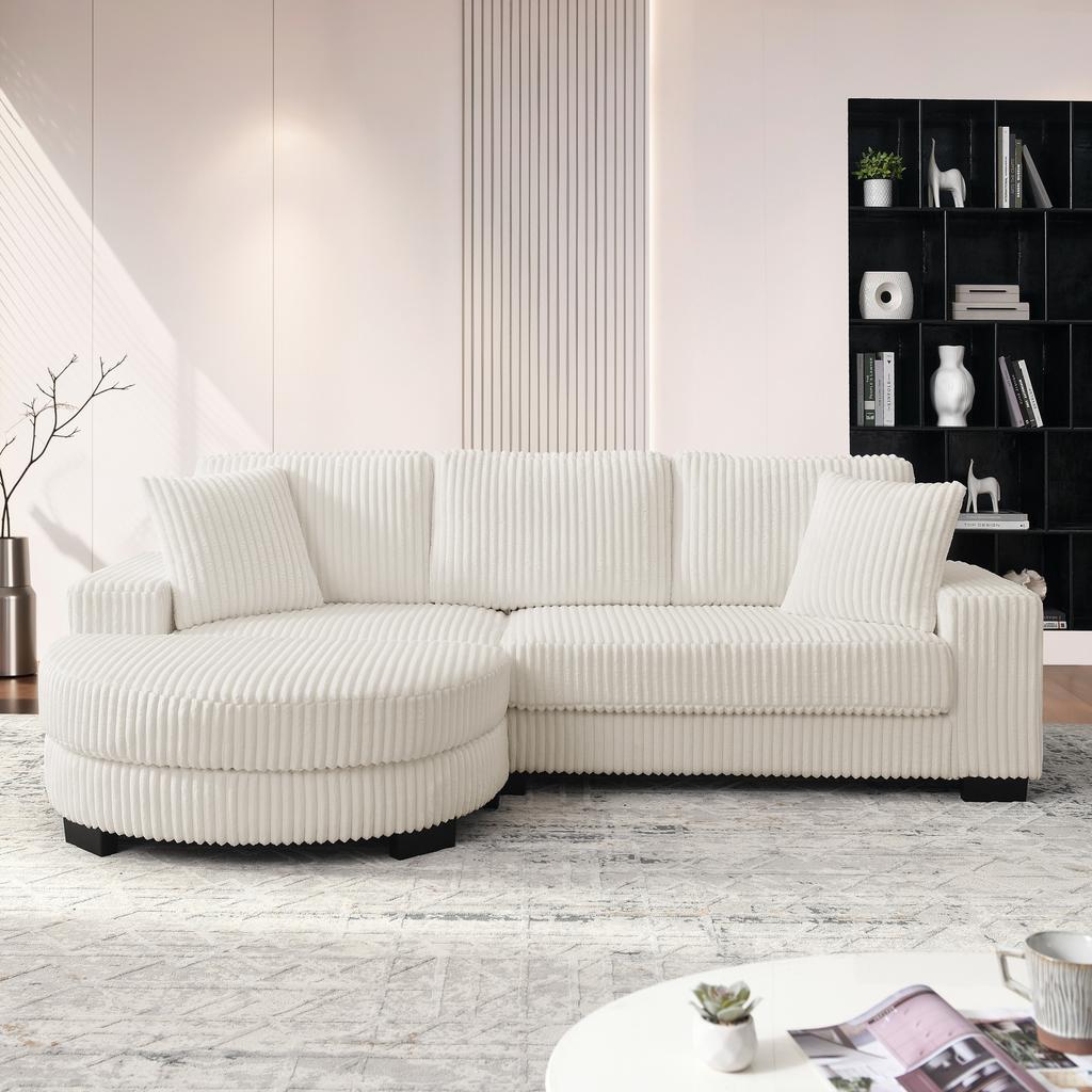 Divano ad Angolo a L - 4 Posti, 256,5 x 133,5 x 89 cm, Velluto a Coste Classico, Design Modulare con Pouf Ovale, 2 Cuscini Inclusi, Beige