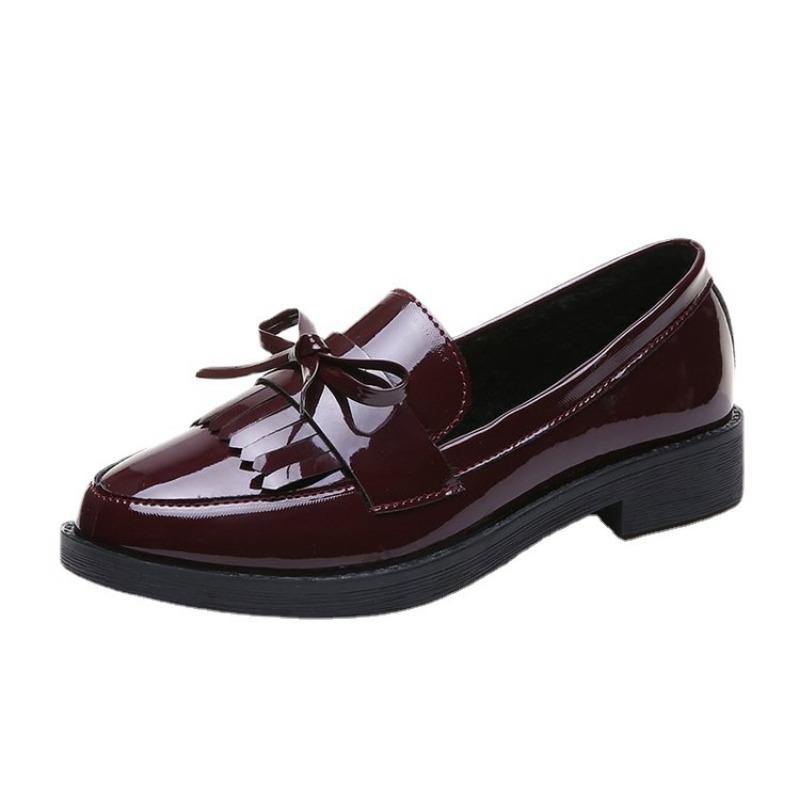 Schwarze Loafer aus Lackleder für Damen, Plateau-Schlupfschuhe, neue britische Frühlingsschuhe mit Quaste, lässige flache Schuhe mit Schleife