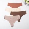 Dámské bezešvé kalhotky tanga s krajkovým lemem a nízkým pasem