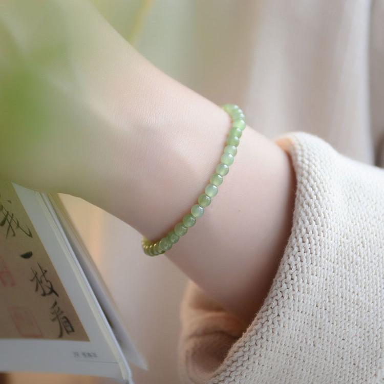 Natural Hetian Jade Bracelet for Women, Ultra-Fine4mm Green jade bead bracelet layered with plain rings in a forest style