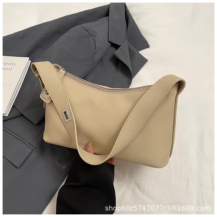 High-end niche armpit bag women's 2025 spring new fashion trendy shoulder bag simple casual commuter bag