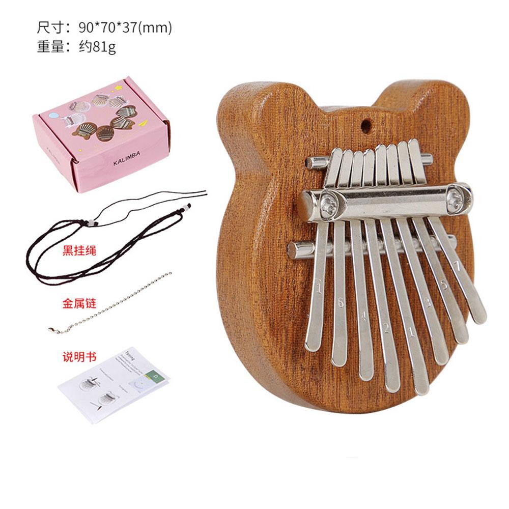 

Bear Ear Style Mini Kalimba 8 Keys Cute Finger Thumb Piano Pocket Marimba Instrument Musical Gift for Kids Christmas Table Decor