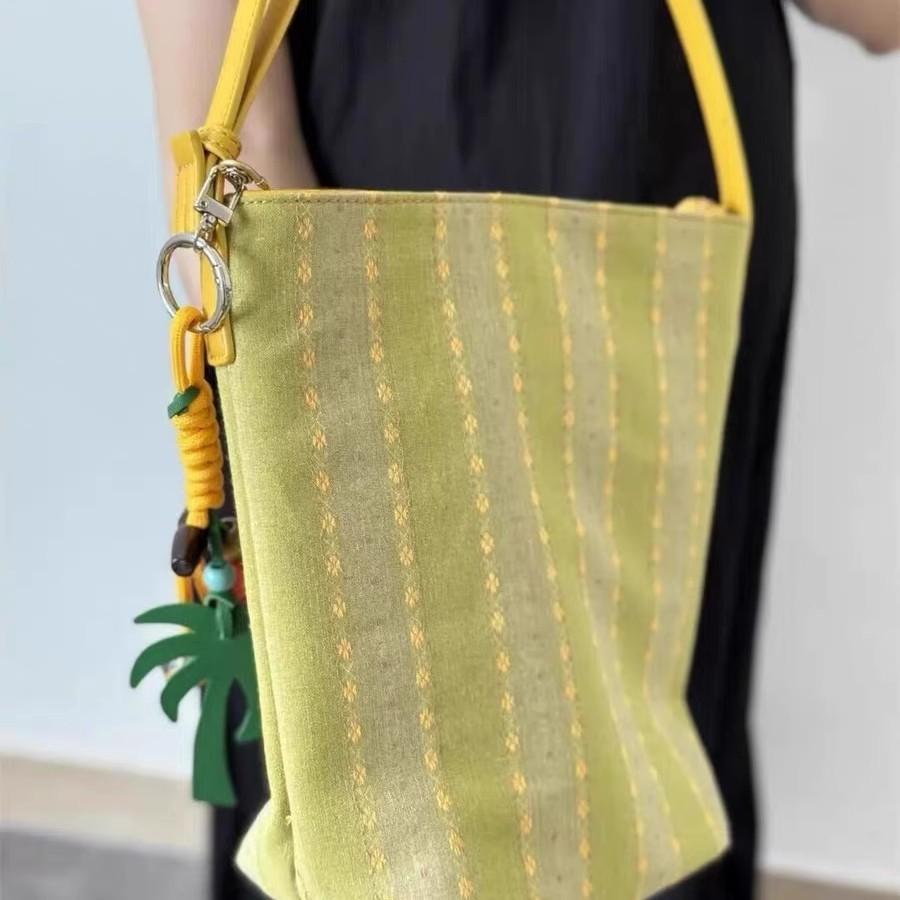 New high-end shoulder armpit bag casual versatile portable bucket bag retro loose canvas bag women