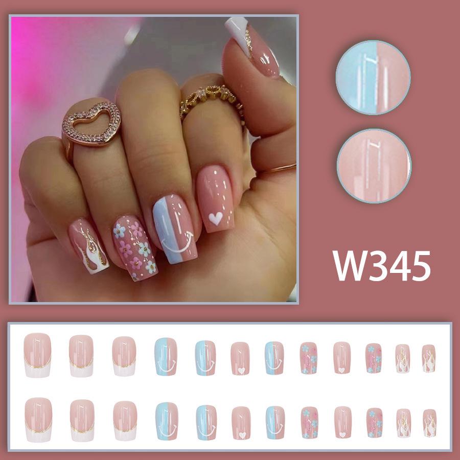 

Sweet Love Smiley Face Nail Art: Mid-Length, Detachable, Wearable Nails with Whitening Flower Design