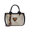 Spring new simple retro hand bucket bag women's shoulder bag high-end texture niche messenger bag