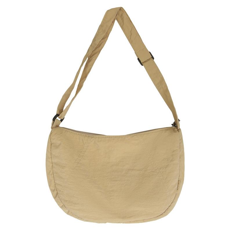 

Japanese single shoulder dumpling bag new women s simple and lightweight nylon bag versatile waterproof solid color messenger bag хакі
