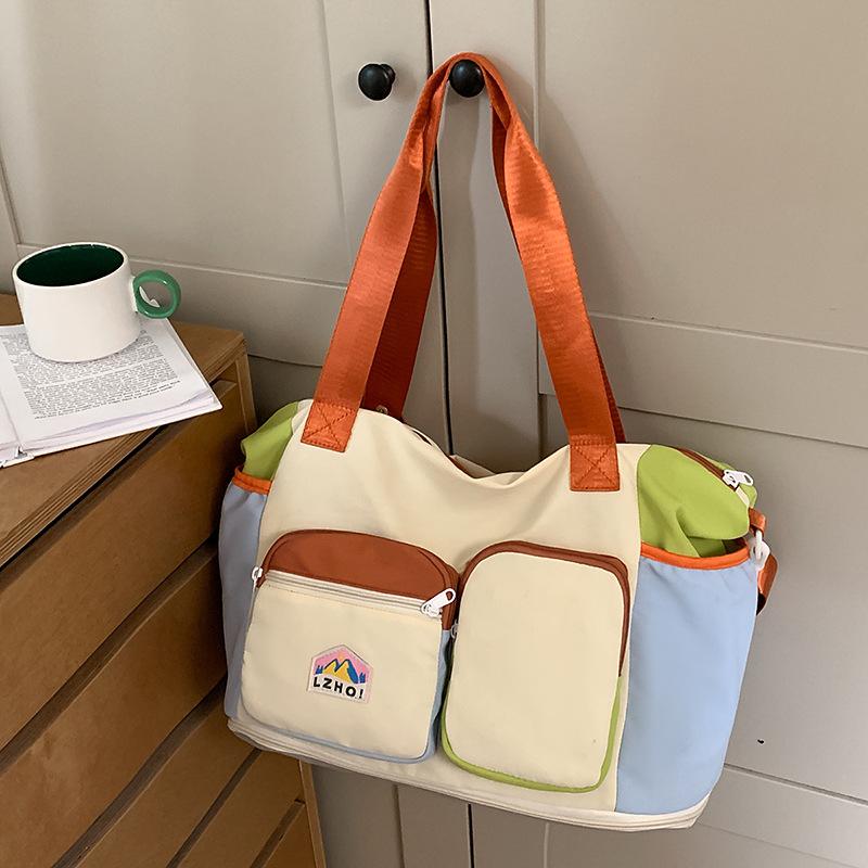 Contrasting travel bags can be expanded, lightweight sports bags, high-value large-capacity fitness bags, travel duffel bags, women