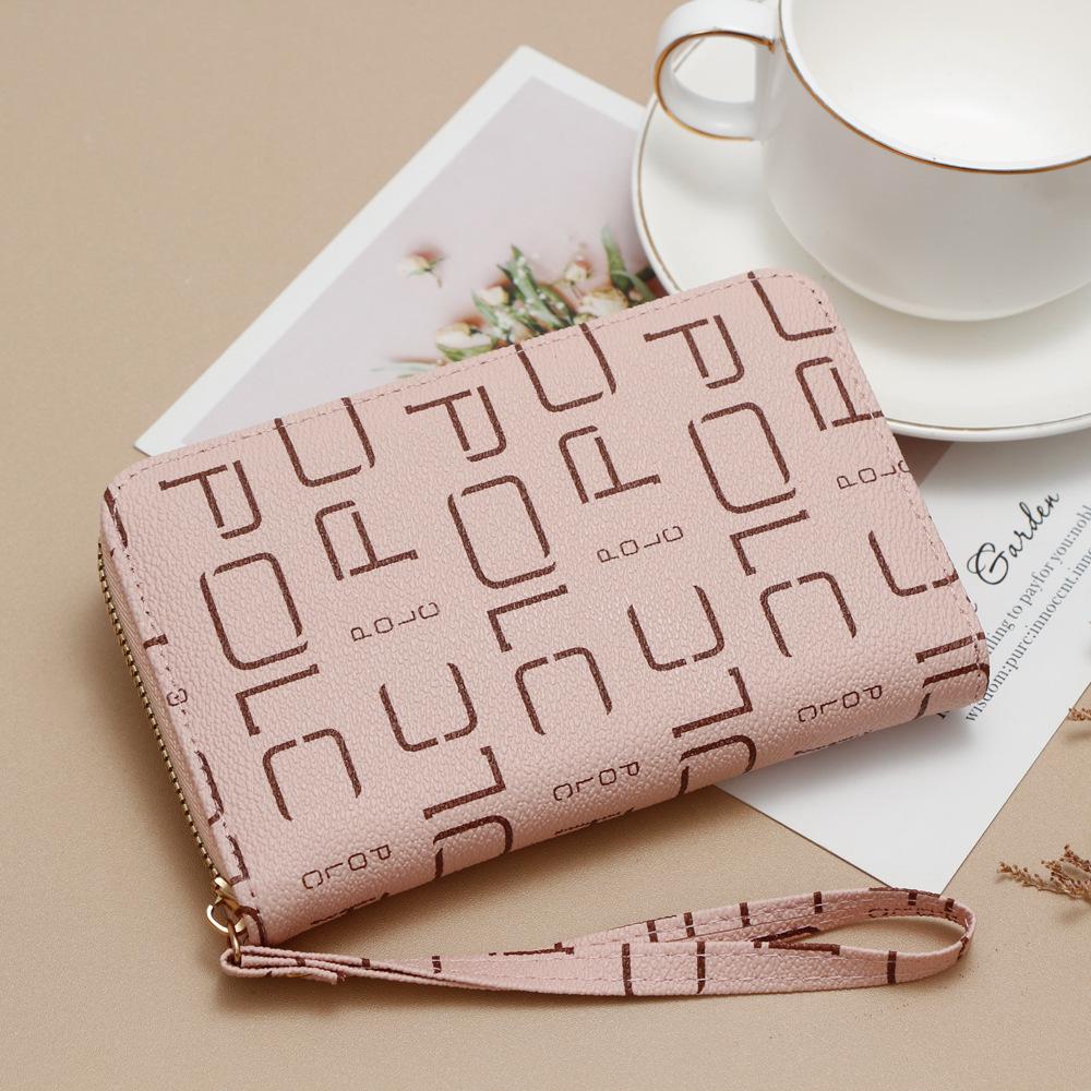 

Жіночий багатофункціональний гаманець для карток та монет великої місткості на блискавці з візерунком у вигляді літер рожевий