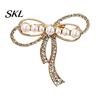 Lapel Pin Bowknot Design Brooch, Strong Buckle Fastening with Faux Pearls Solid Metal Brooch Rhinestones, Electroplating Anti-Oxidation Badge
