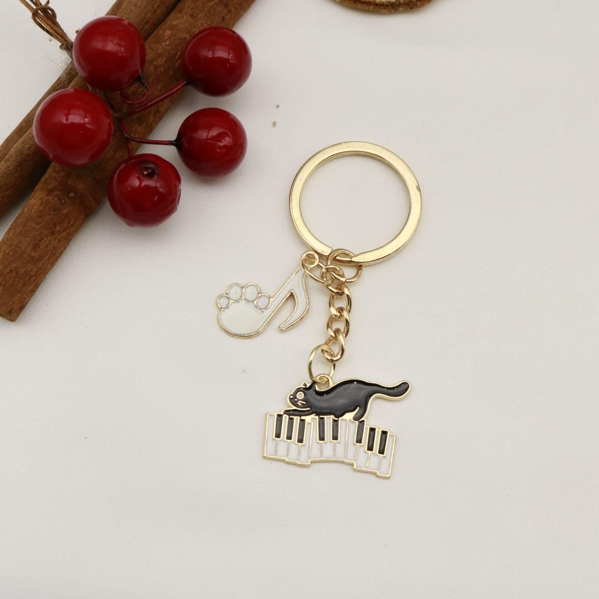 Artistic Cat Piano Notes Keychain | Music & Cat Scratch Alloy Bag Pendant Ornament золотой