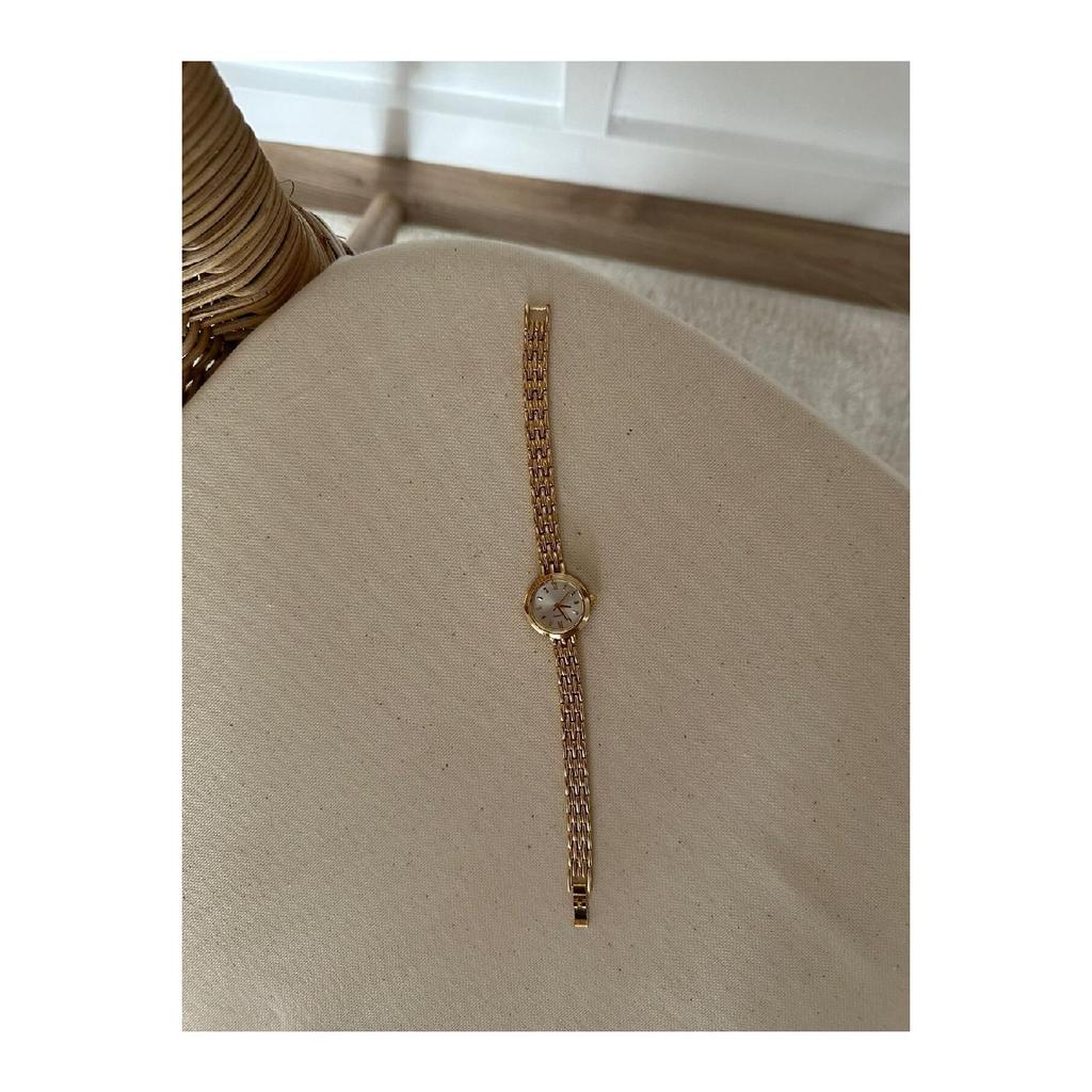 Violette Armbanduhr (Gold)