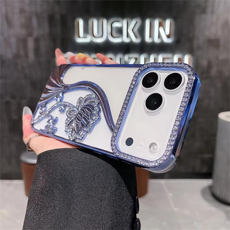 

Glitter Rhinestone Flowers Transparent Phone Case For iPhone 17 Air 16 15 14 13 12 11 Pro Max Plus Plated Armor Frame Back Cover iPhone 17 Pro Max синій