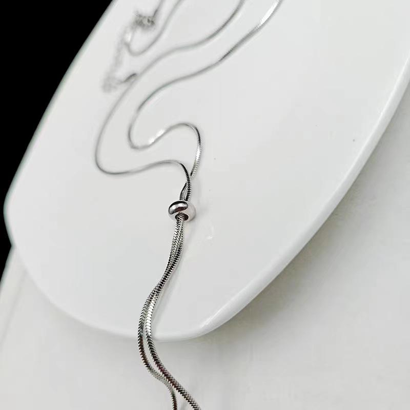 Korean Style Pearl Tassel Necklace: Versatile, Fashionable Long Pendant for Women's Summer Sweaters.