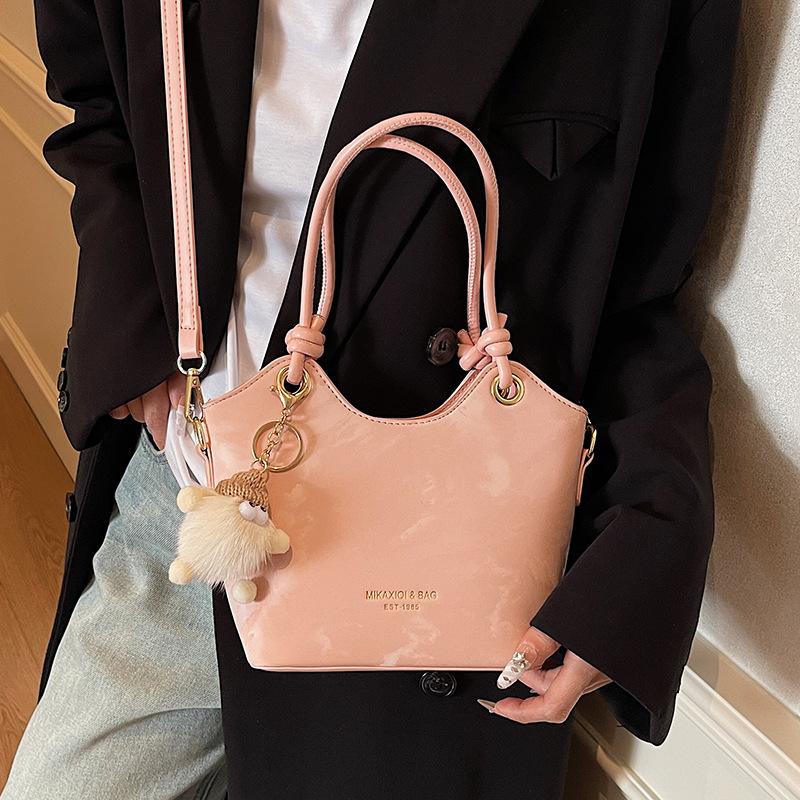 Korean Version of Fashionable Personality Commuting Simple Wind Hand Carrying Bucket Bag Women's Casual Versatile Niche Design Messenger Bag