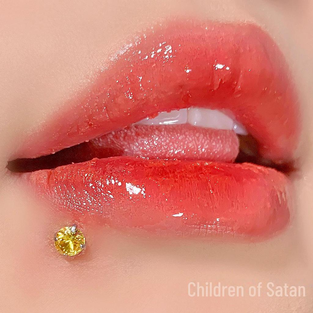'Satan's Child: Luxury Diamond Lip and Ear Studs for Bold Women'
