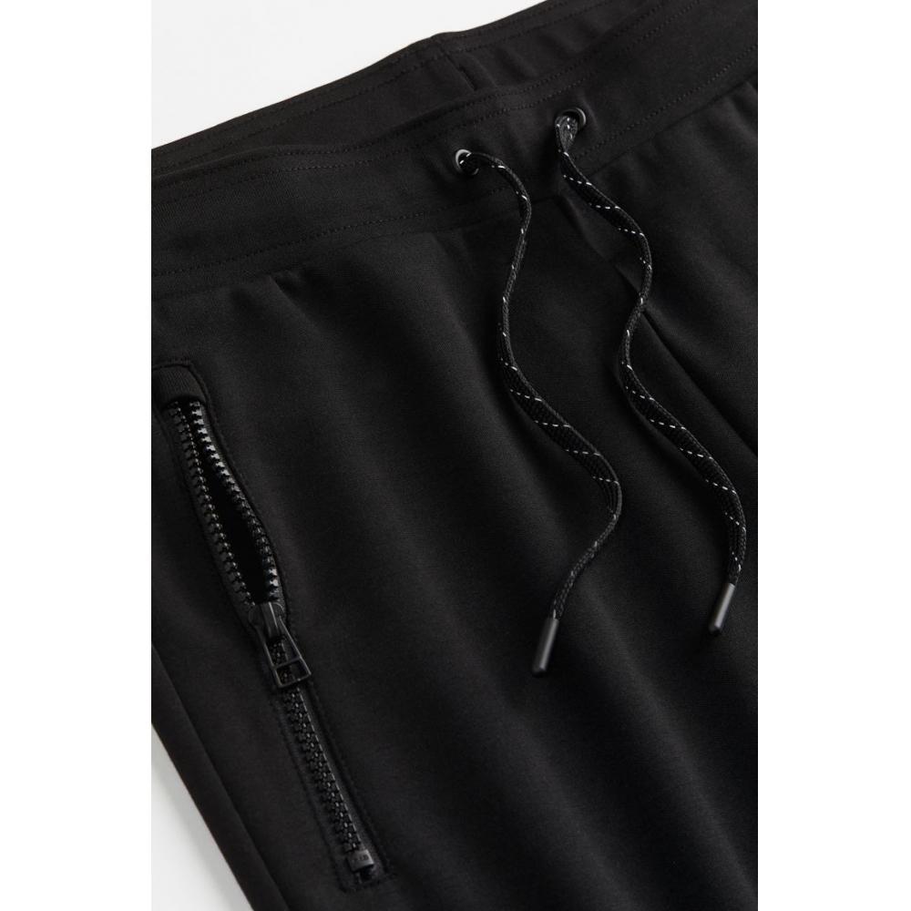 H M dryMove Zip Pocket Detail Tapered tecH Jogger Pants Black
