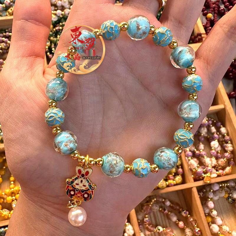 Blue Luminous Cloisonné Rabbit God Bead Bracelet with Gold Foil and Floral Design