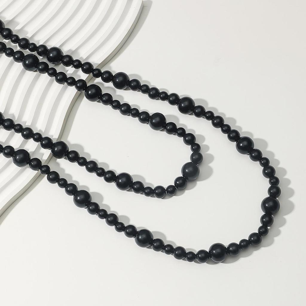 Elegant Retro Pearl Necklace: Women's High-End Light Luxury Sweater Chain.