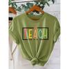 “TEACH them to be kind” Colorful and cute teacher print T Shirt Elegant vintage women's clothing, a gift for the back-to-school season Beautiful
